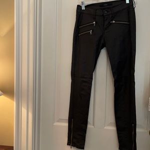 Black pants with zippers